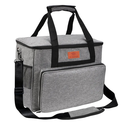 Gray padded sewing machine carrying case with handles and shoulder strap