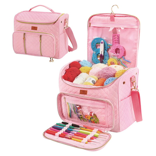 Pink quilted yarn storage bag with clear front pocket and shoulder strap