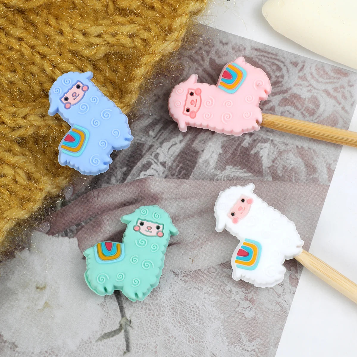 Blue, pink, white and green alpaca silicone knitting needle tip protectors