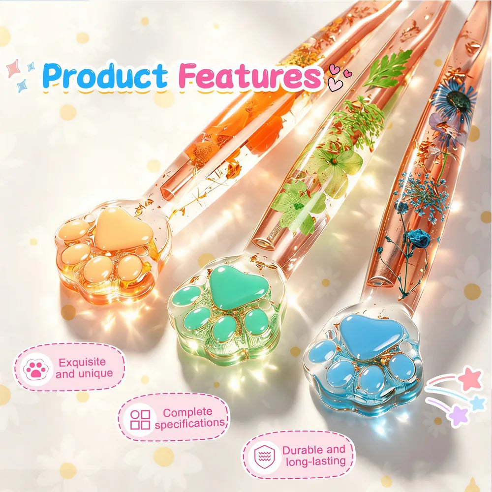 Close-up of colorful cat paw crochet hook handles with flowers and gold foil