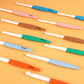 Six colorful ergonomic crochet hooks arranged together with visible size markings