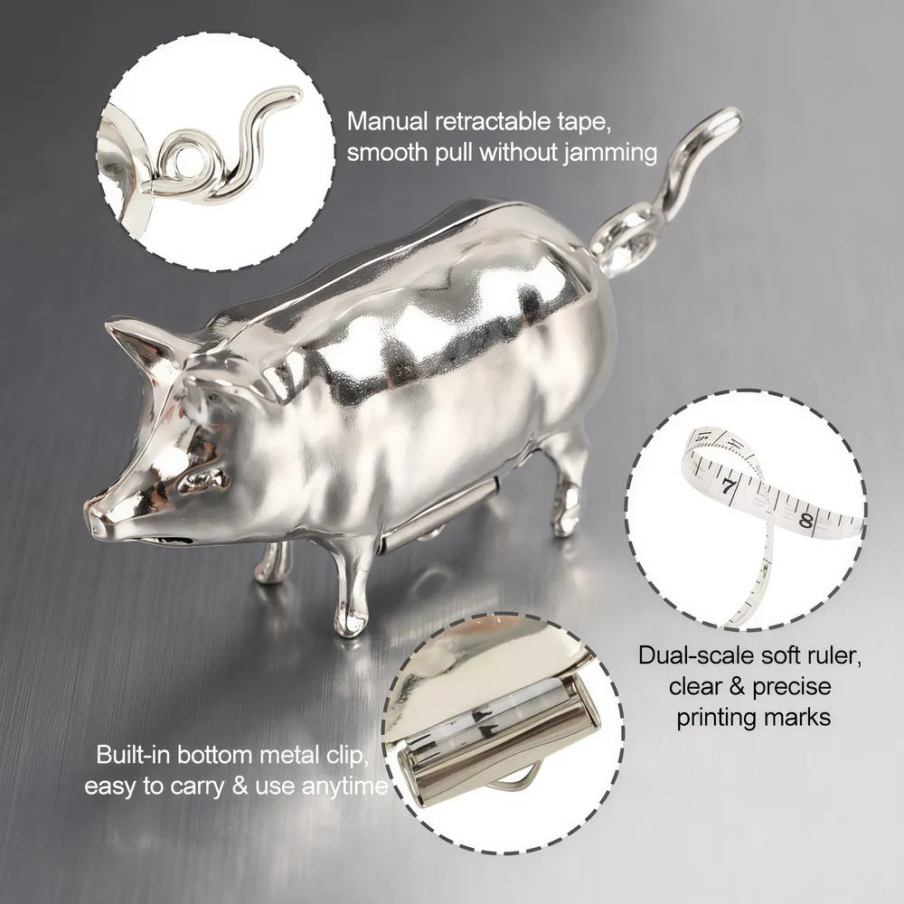 Silver pig tape measure showing manual rewind and dual-scale tape details
