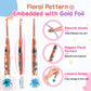 Smooth rose-gold-tone crochet hook with embedded flowers, gold foil and lanyard opening