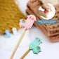 Soft flexible alpaca silicone needle tip protectors in pink and green